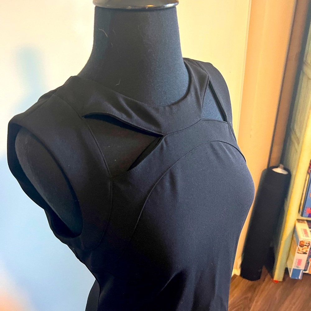 Calvin Klein little black dress size 8. Cutout detail. Geometric. Fitted.